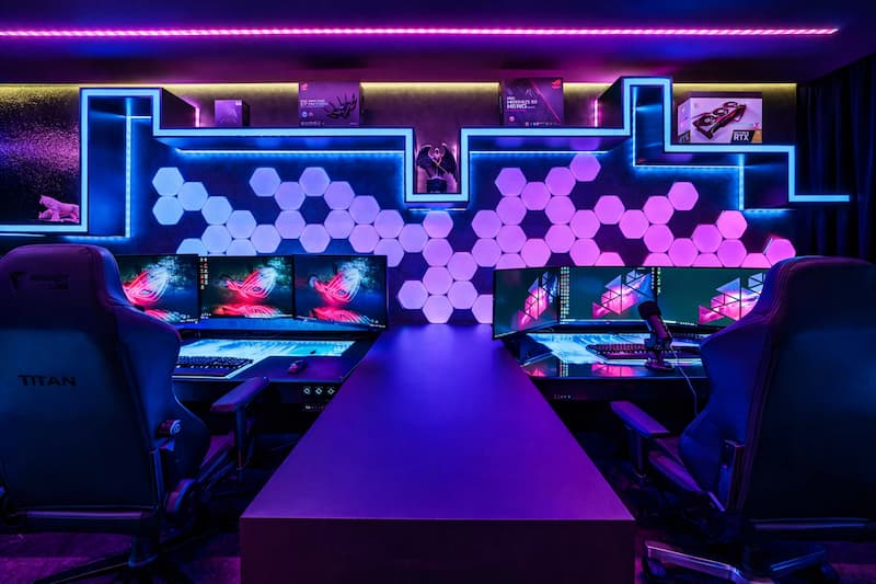Private gaming room with colorful lights and seating